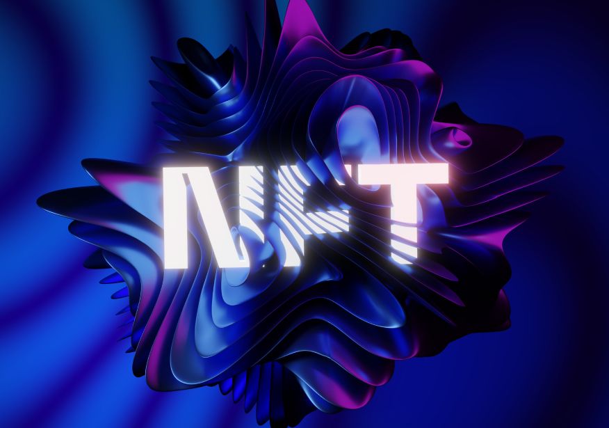 lettering-nft-blue-metallic-wavy-layered-structure-blur-background 2